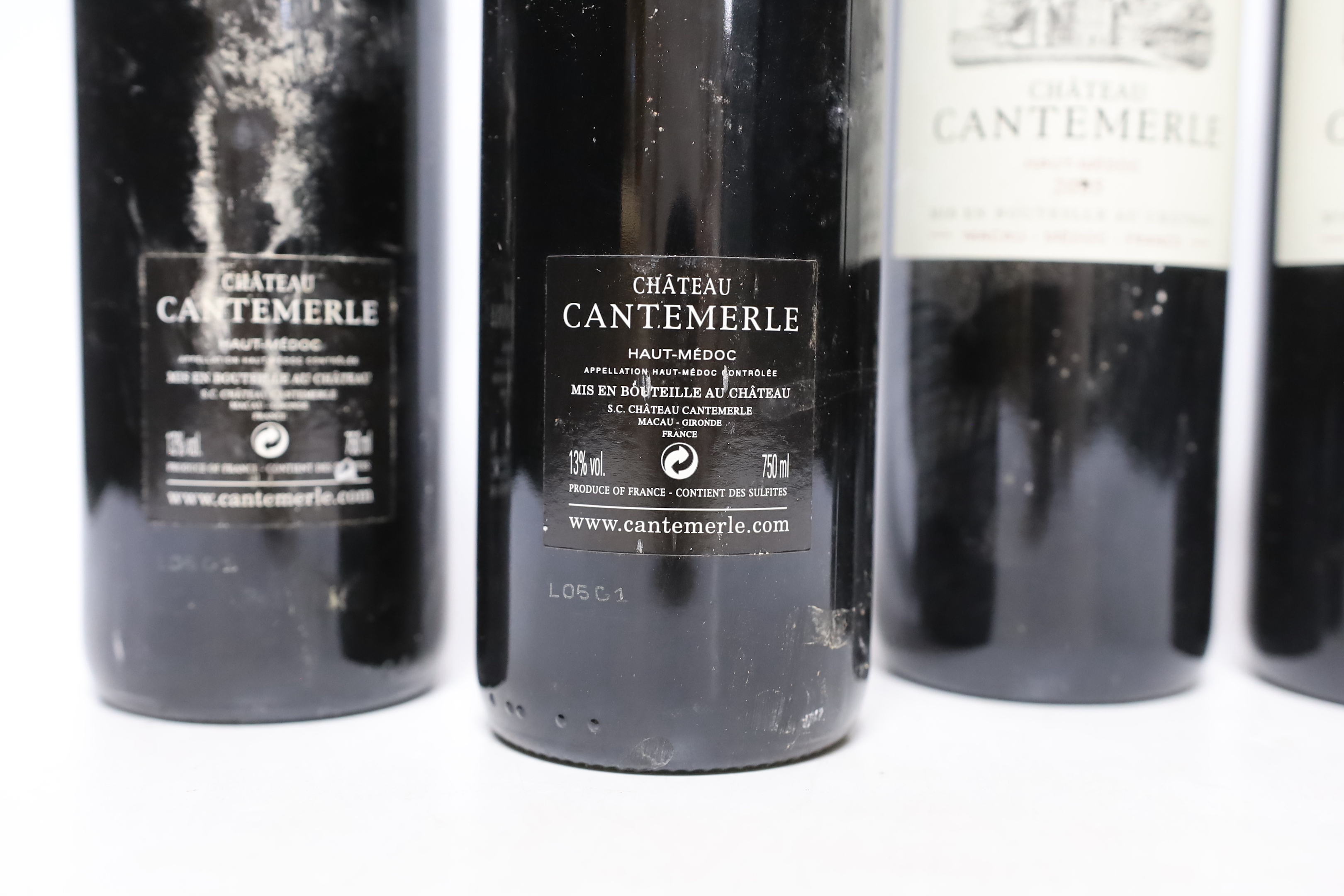 Four bottles of Cantemerle 2009 wine